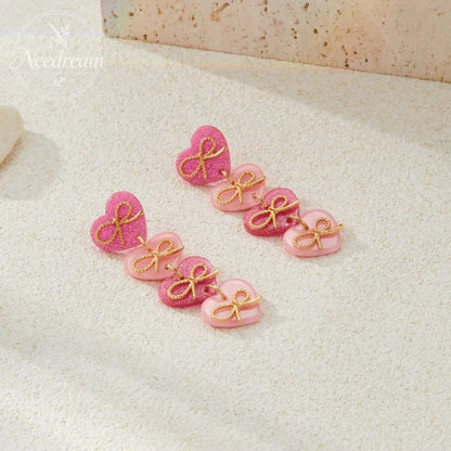 Pink Heart-Shaped Bow Tassel Earrings