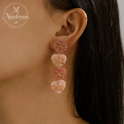 Pink Heart-Shaped Bow Tassel Earrings